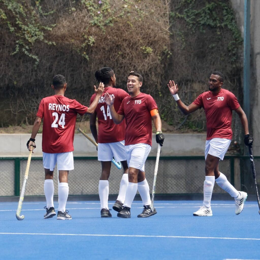 Trinidad and Tobago hockey men's players celebrate a goal. PHOTO COURTESY PAN AMERICAN HOCKEY FEDERATION FACEBOOK PAGE - 