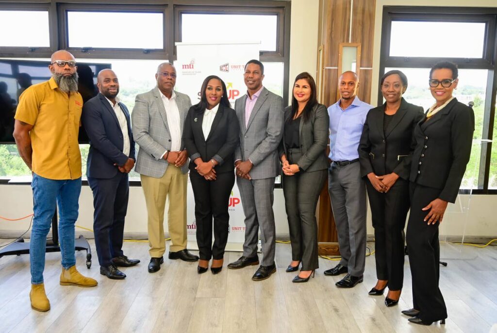 Deon Rojas, Rojas Engineering Ltd, left; Deyson Scott, chief sales and marketing officer, UTC; Curtis Williams, chairman, Tobago Division of TT Chamber; Petal Ann Roberts, THA Secretary, Division of Finance, Trade and Economy; Nigel Edwards, executive director, UTC; Hema Ramkissoon, head of marketing, UTC; Waltnel Sosa, local representative of Entrepreneurship Policy Advisors; Desiree Hackett-Murray, senior financial advisor and Wendy Bishop, manager at Scale Up TT business luncheon at Comfort Inn and Suites, Tobago on September 10. - Photo courtesy UTC