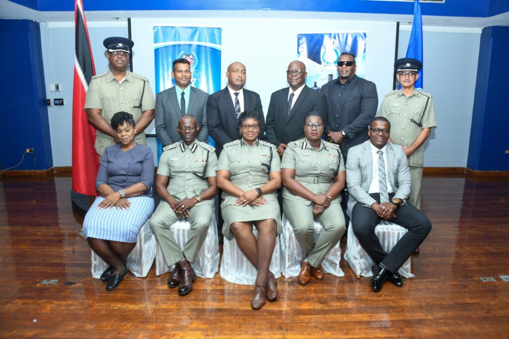 Police Commissioner Erla Harewood-Christopher, centre, poses for a photo with newly-promoted officers and other senior TTPS members at the Police Administration Building, Port of Spain, on September 12. 