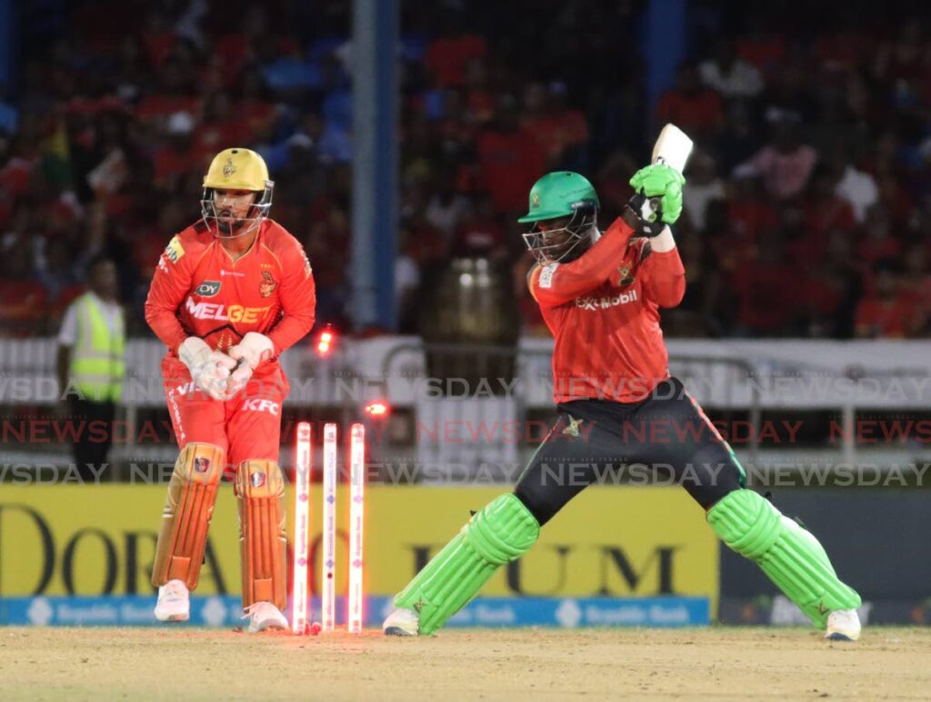 Guyana Amazon Warriors batsman Kevin Sinclair looks back at his wicket after being bowled during the Republic Bank Caribbean Premier League T20 match against Trinbago Knight Riders, at the Queen’s Park Oval, St Clair, on September 18. - Photo by Angelo Marcelle