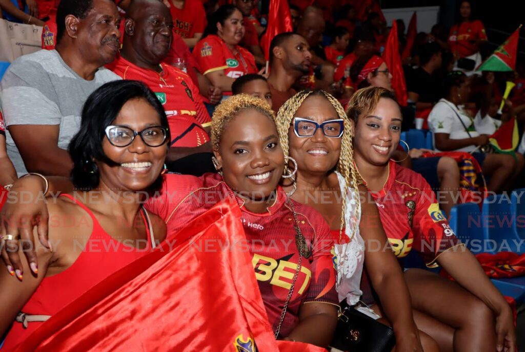 From left, Newsday staff members Veela Mungal, Kafi Nicholas, Debra Greaves and Ayana Huggins show their support for the Trinbago Knight Riders on September 18.  - Photo by Ayanna Kinsale