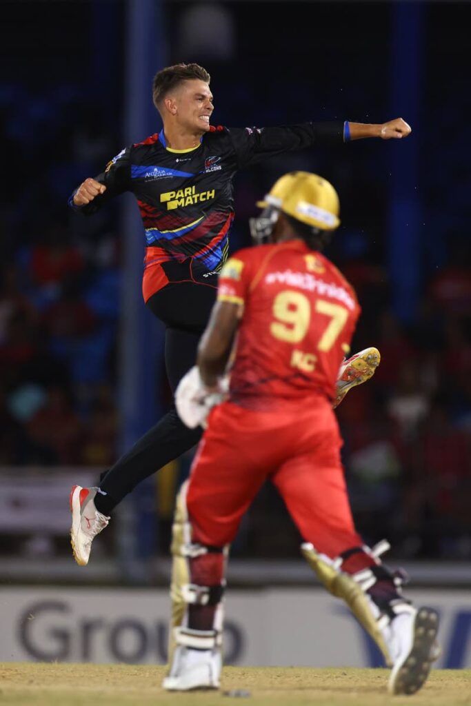 :Chris Green of Antigua and Barbuda Falcons celebrates after getting the wicket of Keacy Carty of Trinbago Knight Riders during the Men's 2024 Republic Bank Caribbean Premier League match between Trinbago Knight Riders and Antigua & Barbuda Falcons at Queen's Park Oval on September 19, 2024 in Port of Spain, Trinidad And Tobago. - (CPL T20)