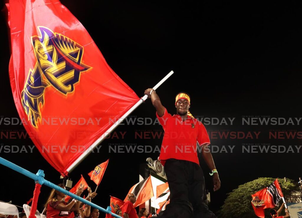 TKR MOKOS: TKR moko jumbies and fans wave their flags high during the CPL T20 match between the Trinbago Knight Riders and the Antigua & Barbuda Falcons at the Queen's Park Oval, Port of Spain on September 19. - Photo by Faith Ayoung