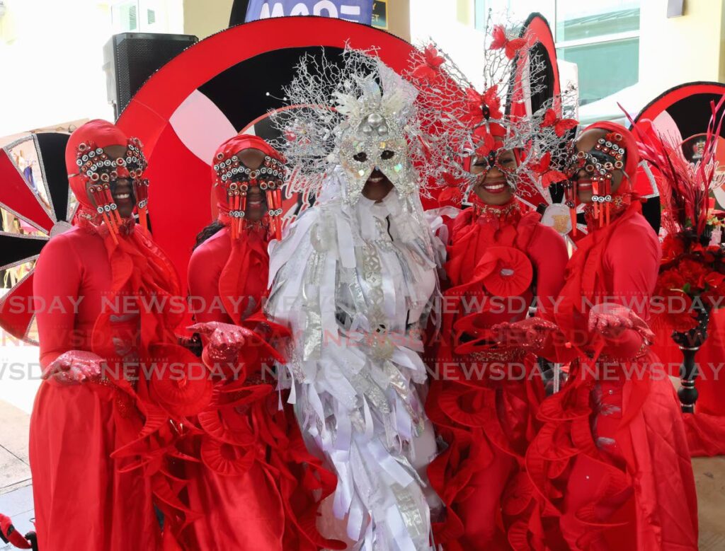 Natania James, left, Naomi Stewart, Alicia Scott, Semoi Matthew and Jernikqua Delice of Carvalho Productions at the opening of the Craft Hub TT National Republic Day Craft Market on September 21. - Photo by Roger Jacob