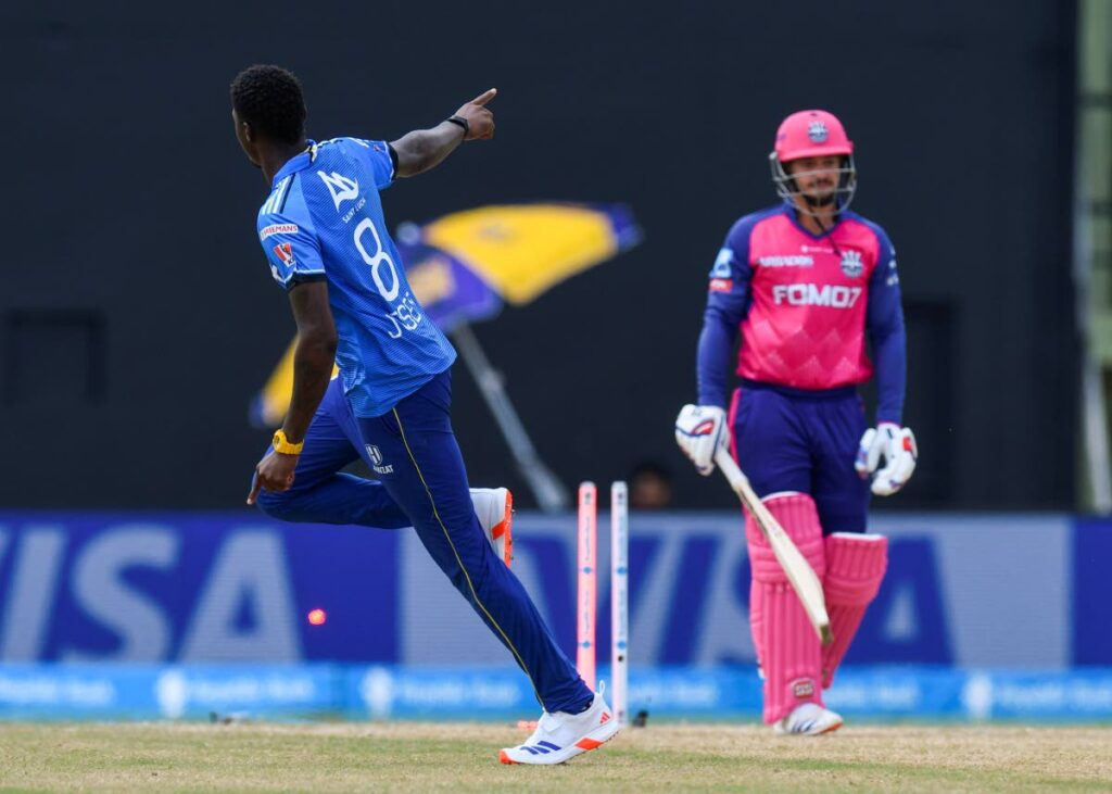 St Lucia Kings pacer Alzarri Joseph (L) celebrates the dismissal of Barbados Royals opener Quinton de Kock during their 2024 Republic Bank CPL match at Providence Stadium in Guyana on September 21, 2024. (CPL T20)  - 