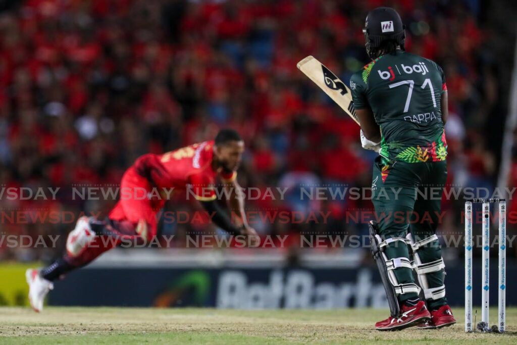 Christopher Jordan of Trinbago Knight Riders catches out Kyle Mayers of St Kitts and Nevis Patriots during the Republic Bank Caribbean Premier League at the Brian Lara Cricket Academy, Tarouba on September 22. - Photo by Daniel Prentice