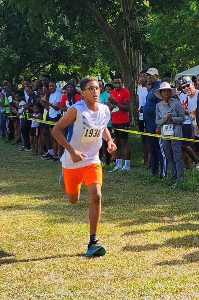 Arima Central Secondary's Mikael Serrette approaches the finish line to take top spot in the boys' under-15 category at the Trinidad leg of the Secondary Schools Track and Field Cross-Country Run at the Queen's Park Savannah, PoS on September 22, 2024. - Photo courtesy Roxane Romeo