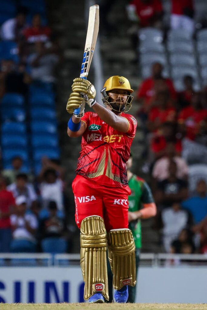 Trinbago Knight Riders' Nicholas Pooran looks on after playing a shot against the St Kitts and Nevis Patriots, during their Caribbean Premier League T20 match, on Septmber 22, 2024 at the Brian Lara Cricket Academy, Tarouba. - Daniel Prentice