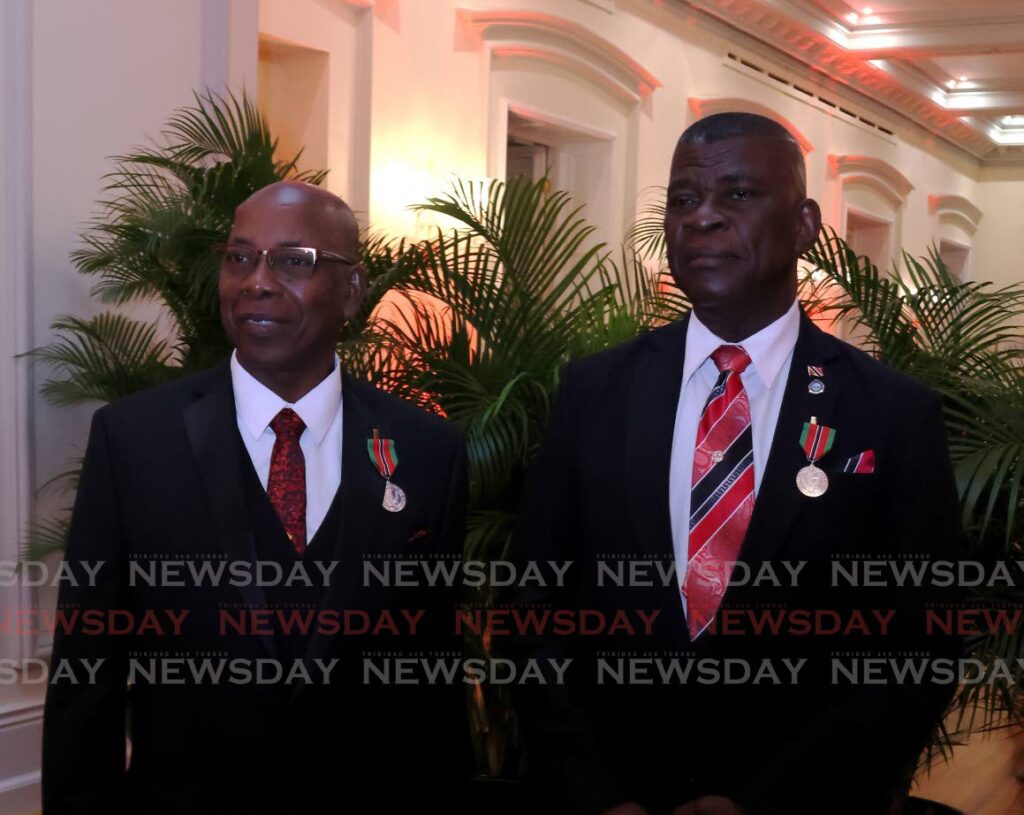 IN SERVICE: Former acting commissioners Stephen Williams and James Philbert after receiving their national awards at the Republic Day National Awards 2024 ceremony at President's House, Port of Spain, on September 24. - Photo by Roger Jacob