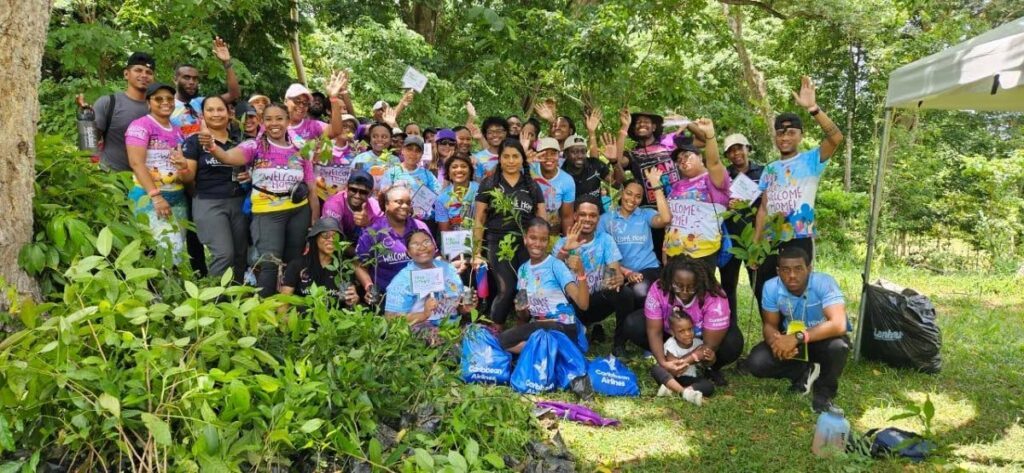 Caribbean Airlines’ team members at Courland Watershed Tobago on September 21. - 