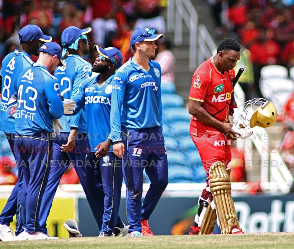 A dejected Dwayne Bravo of TKR walks off the field after retiring hurt in the 2024 Republic Bank  CPL T20 match against the St Lucia Kings at the Brian Lara Cricket Academy, Tarouba on September 24. Bravo was in tears as he walked off. - Photo by Lincoln Holder 