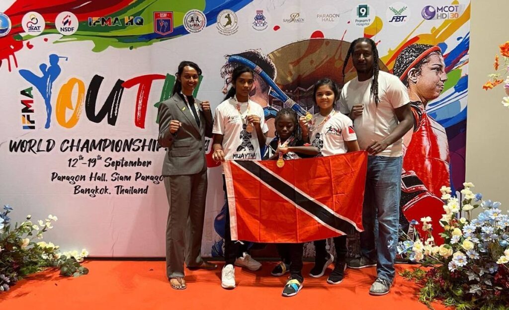 Trinbago Muaythai Association president and coach Rebecca Bhola, from left, athletes Vandana Bahadursingh, Sphinx Prescod and Vishala Bahadursingh, along with assistant coach Shai Prescod.  - 