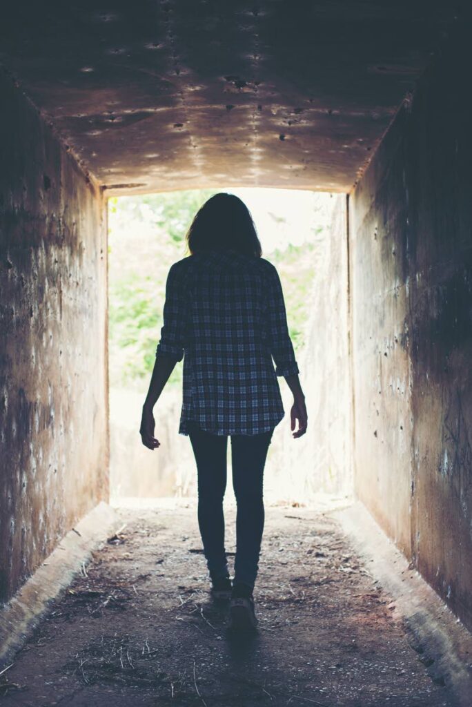 A girl depicted as Ellen is walking through a tunnel, leaving behind her previous life in a gang. 
Photo courtesy FREEPIK - 