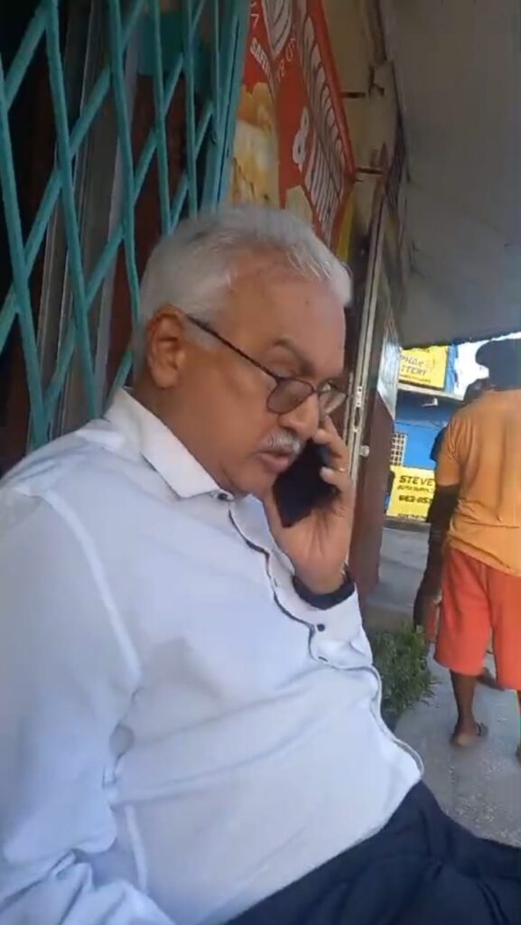 A screenshot from a video circulating on social media showing Minister of Health Terrence Deyalsingh outside Nyahbinghi’s bar, St Joseph after being robbed on September 17. - 