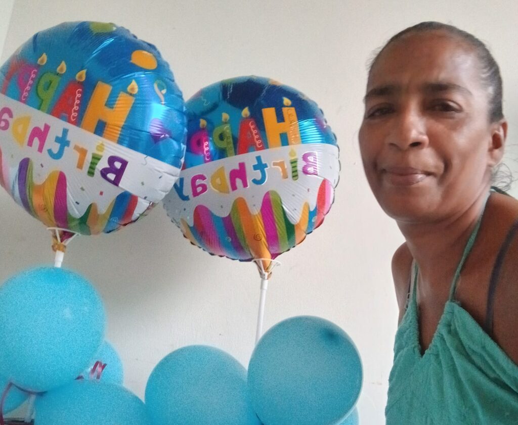 TRAGIC LOSS: In this photo placed on her Facebook page on September 26, Sacha Richardson stands near balloons as she celebrated her 52nd birthday. Hours later, she was killed in a crash, while dropping a relative home. -