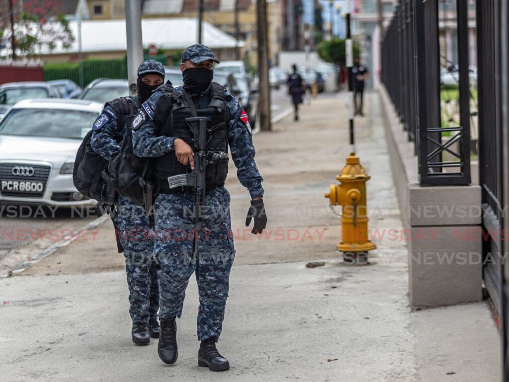 Police officers in the digital camouflage tactical wear that will be allowed for use only by the Guard and Emergency Branch and the Inter-Agency Task Force from October 18. -  File photo by Jeff K. Mayers