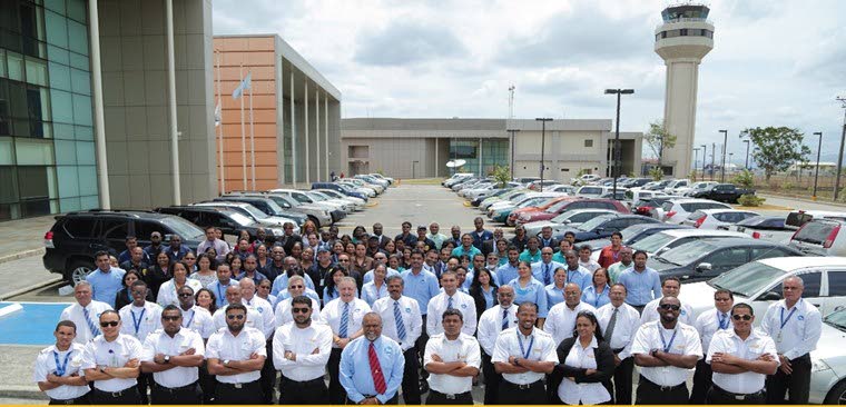 Opening of the TT Civil Aviation Authority complex in 2010 with director general Ramesh Lutchmedial, front centre, and staff.  - 