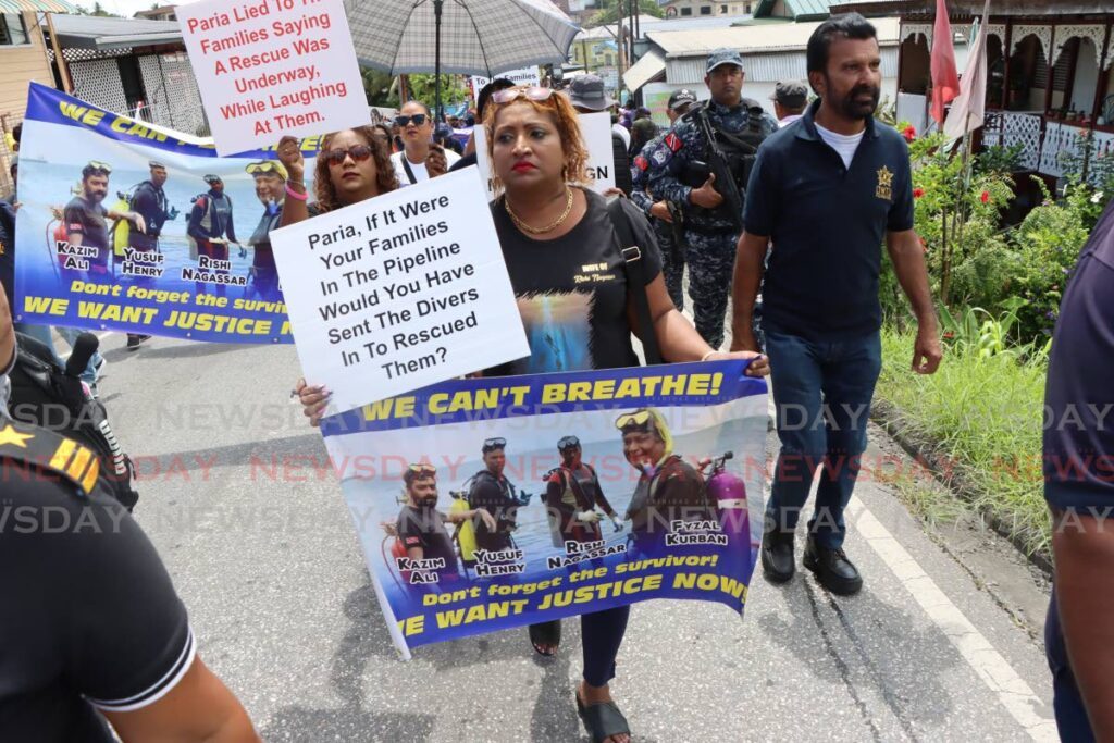 Vanessa Kussie, widow of Rishi Nagassar one of the four deceased Paria divers, marches with the trade unions on Labour Day, Fyzabad on June 19, 2023. - File photo by Angelo Marcelle 