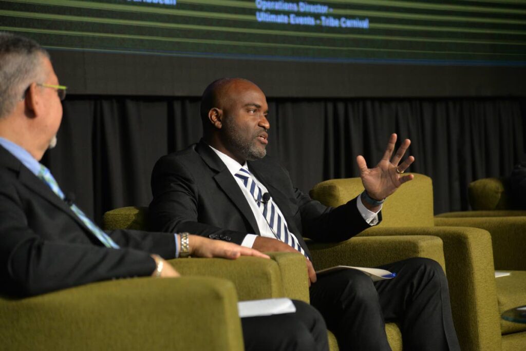 Republic Bank economist Garvin Joefield, right, speaks at the TT Chamber Business Outlook Forum, at the Hyatt Regency, Port of Spain in 2023. - File photo