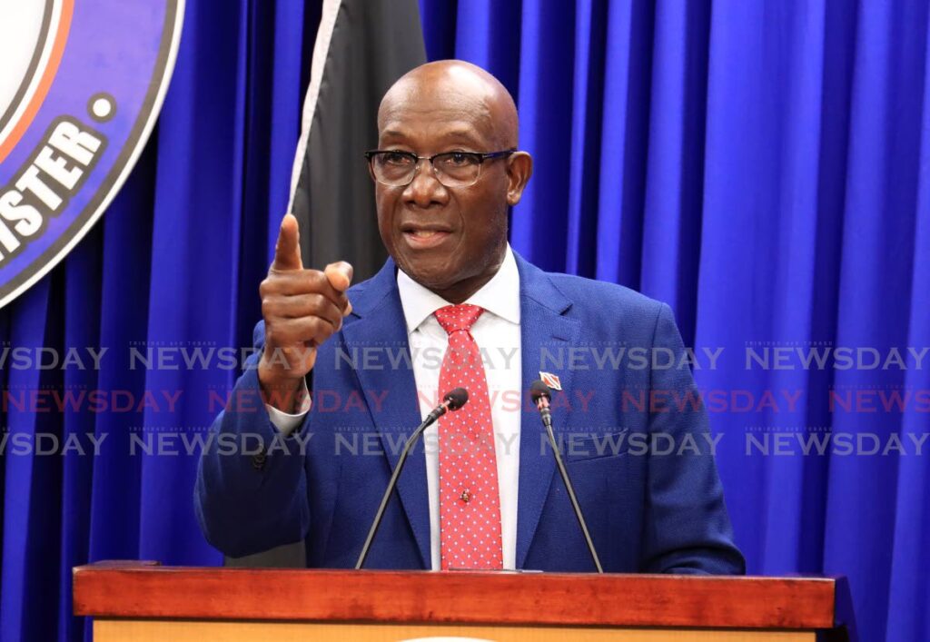 Prime Minister Dr Keith Rowley makes a firm point during a post-Cabinet media briefing at Whitehall. Rowley is is a subject of blogger Vishal Persad's legal challenge for disclosure of National Security Minister Fitzgerald Hinds' WhatsApp messages to the Prime Minister and police commissioners. - File photo by Roger Jacob