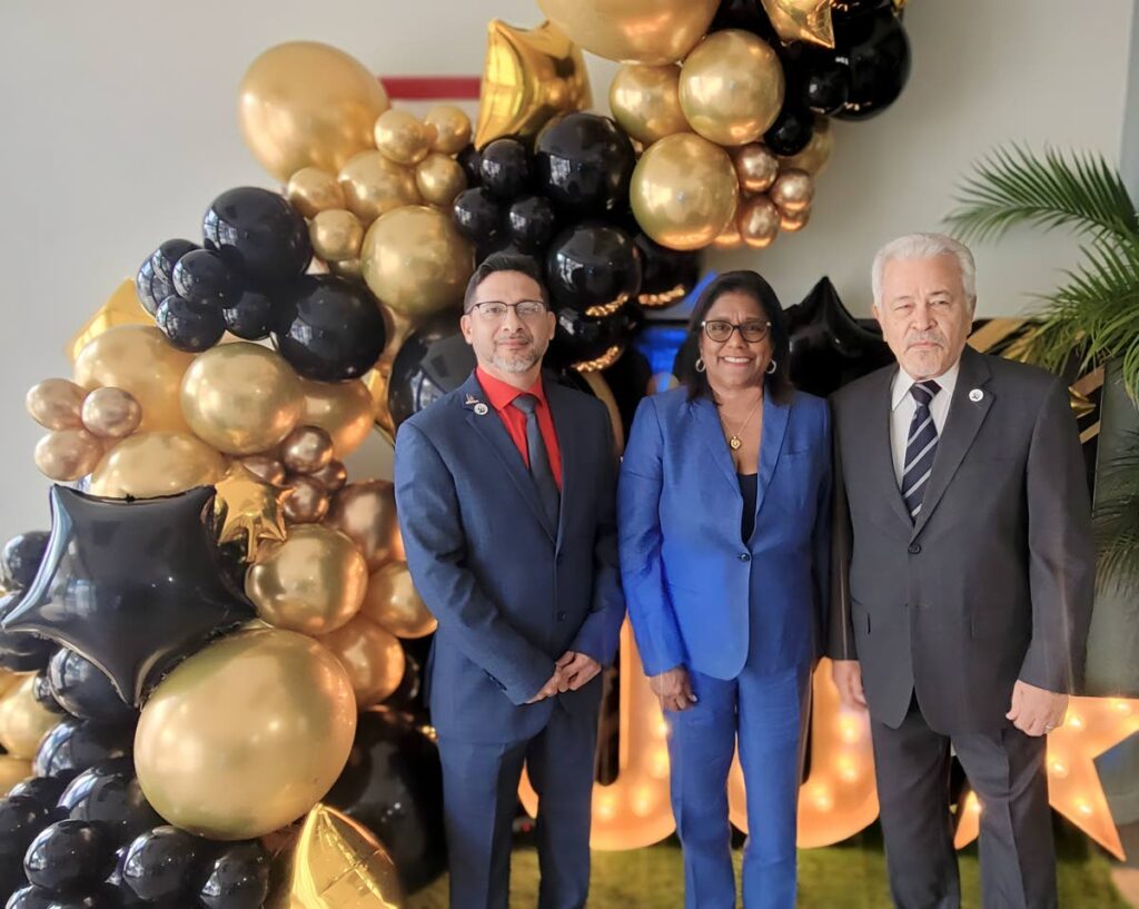 Trade Minister Paula Gopee-Scoon, centre, flanked by Jose Trejo, TTBS executive director, left, and Lawford Dupres, chairman, at the bureau's 50th anniversary celebrations.
Photo courtesy MTI - 