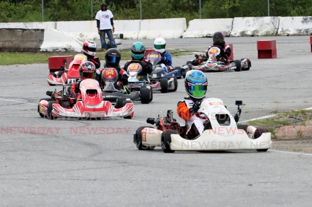 Drivers in the sportsman category make their way around the track during the Karting Championship Event Seven at the Wallerfield International Raceway, Wallerfield on September 29. - Photos by Ayanna Kinsale