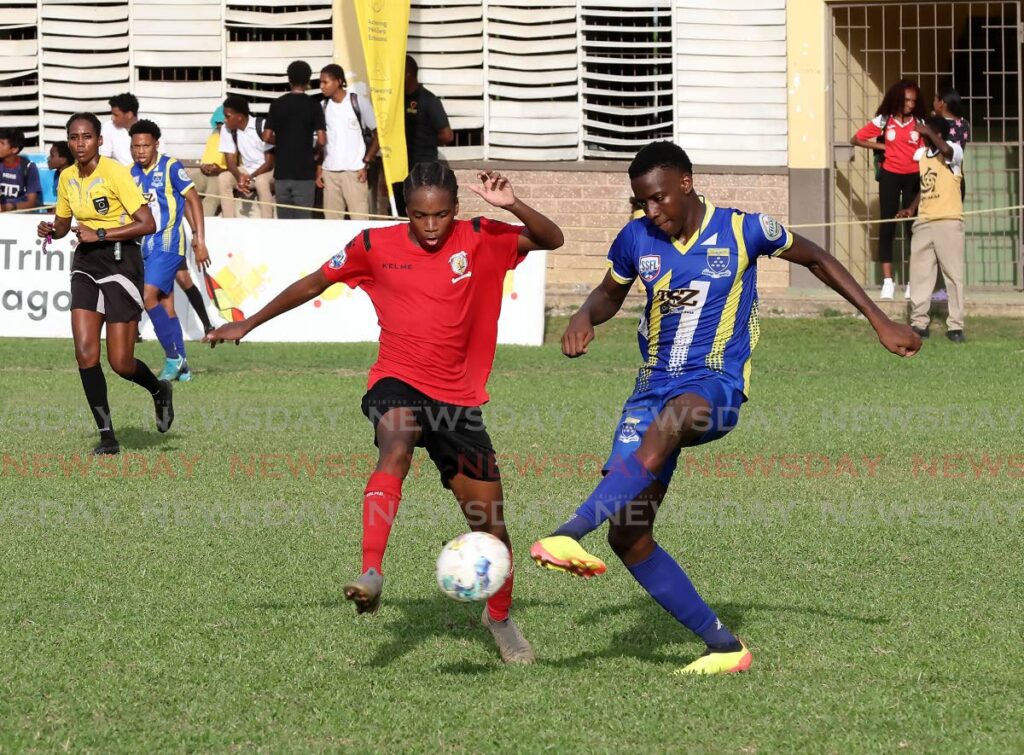 St Anthony’s College’s Jaeden Bobb (L) and Fatima College’s Micah Leach vie for the ball during their Secondary Schools Football League premiership division match, on October 2, 2024 at the St Anthony’s College grounds, Westmoorings.  - Photo by Roger Jacob