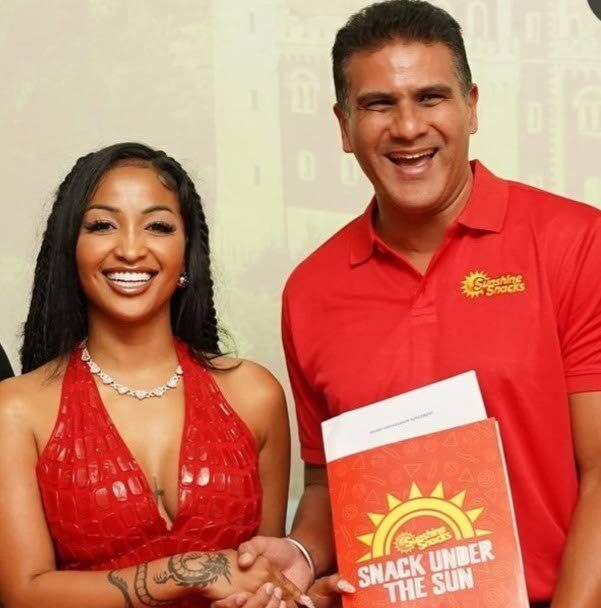 Shenseea and Nicholas Lok Jack, group CEO Associated Brands, at the announcement of the dancehall artiste and her son as brand ambassadors for Sunshine Snacks in Jamaica on September 25. Photo credit: Sunshine Snacks Instagram - 