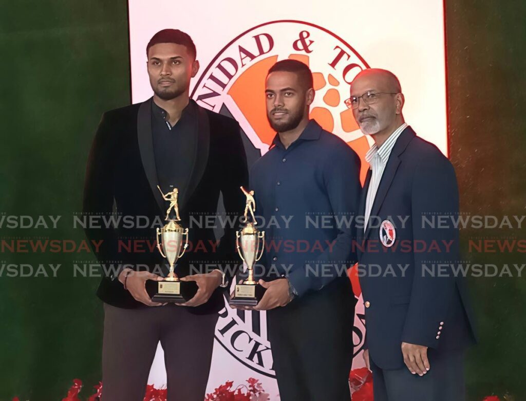 Premiership one awardees Isaiah Rajah, left, and Avinash Mahabirsingh, centre, alongside TTCB vice president Arjoon Ramlal at the TTCB annual awards ceremony on October 5, at the Brian Lara Cricket Academy, Tarouba. - Photo by David Scarlett