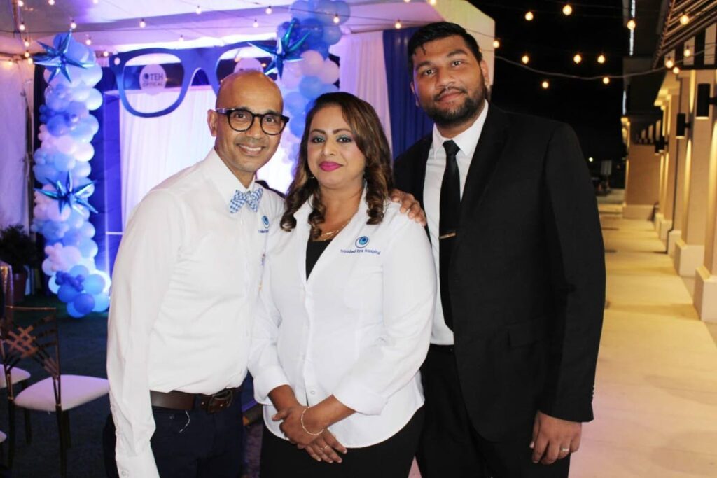 Dr Ronnie Bhola, left, Erron Seenath, optical services supervisor and, Ibraheem Mohammed optical manager of Trinidad Eye Hospital Optical. - 