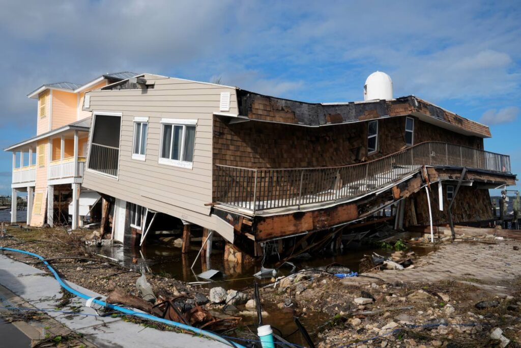 Houses lie in ruins after sustaining tornado and flood damage from Hurricane Milton, Thursday in Matlacha, Florida. AP PHOTO - 