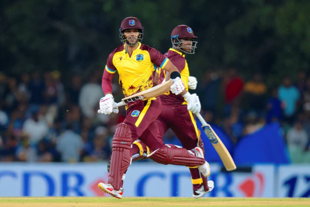 West Indies’ Brandon King (L) and Even Lewis run between the wickets during the first Twenty20 against Sri Lanka in Dambulla, Sri Lanka, on October 13. West Indies won by five wickets. AP Photo - 