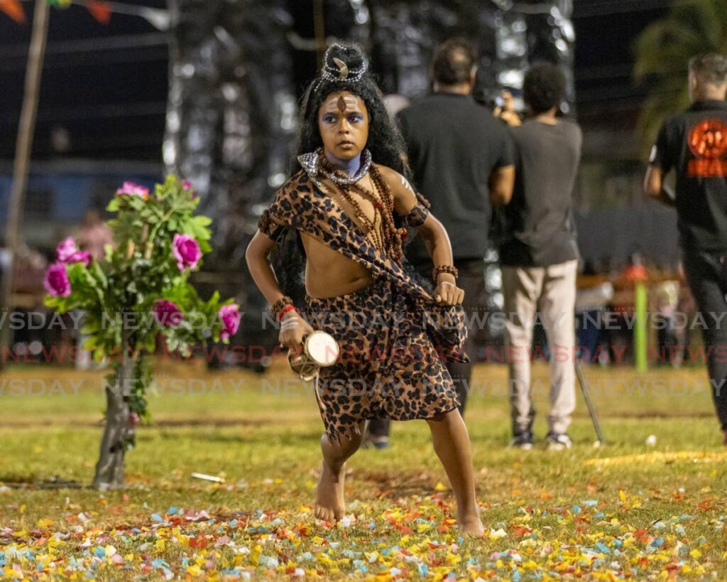 SHIVAN'S PORTRAYAL: Shivan Rampersad portrays Lord Shiva during Ramleela celebrations at Pierre Road in Charlieville on Sunday evening. - Photo by Jeff K. Mayers