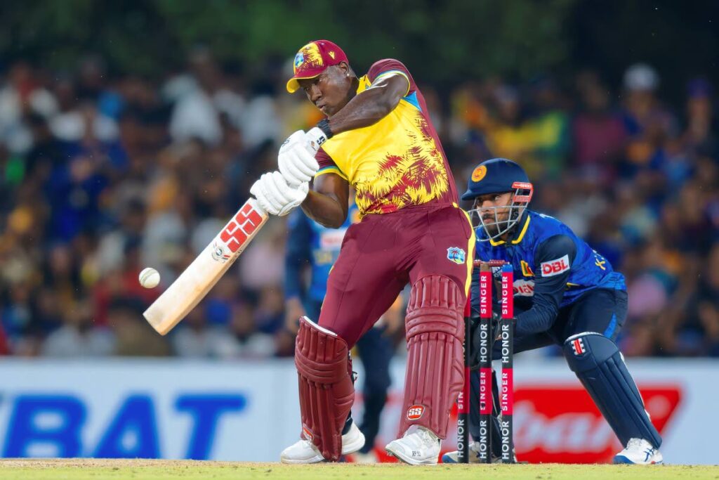 West Indies’s Captain Rovman Powell plays a shot during the third Twenty20 against Sri Lanka in Dambulla, Sri Lanka, on October 17., 2024. - AP PHOTO