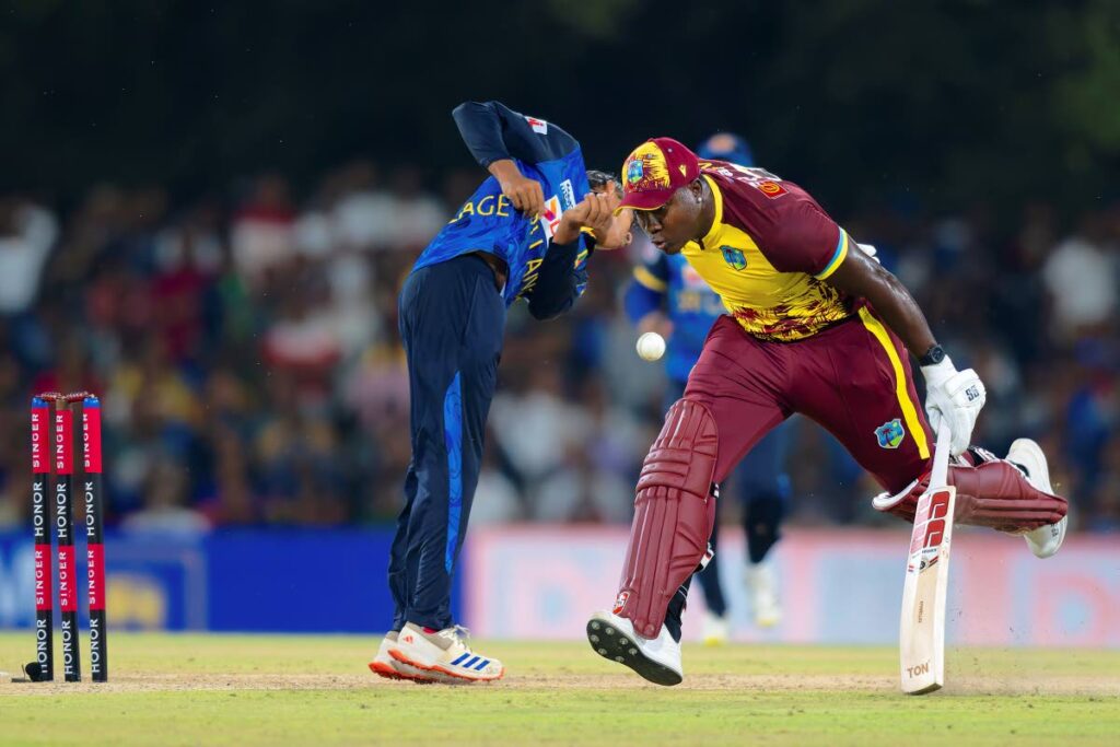 West Indies's Captain Rovman Powell makes his crease during the third Twenty20 against Sri Lanka in Dambulla, Sri Lanka, on October 17.  - 