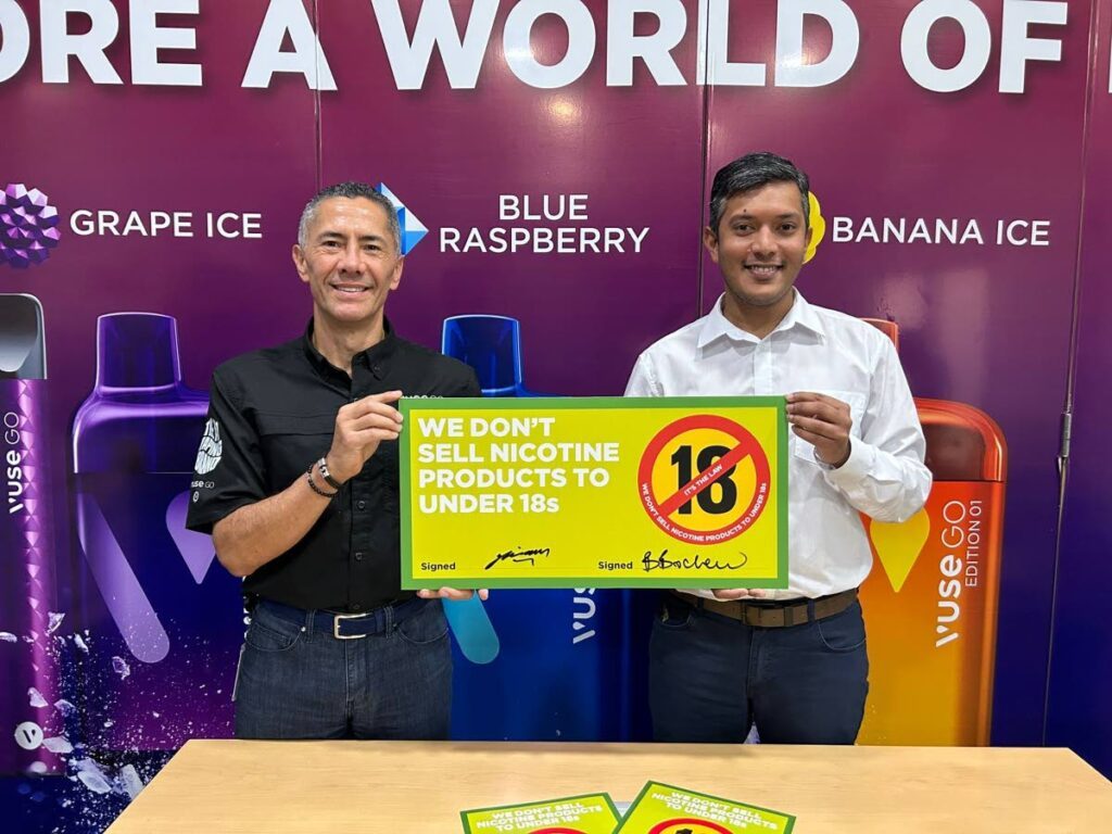 From left, Hiram Murillo, acting managing director of  West Indian Tobacco Company Limited, and Biondi Bachew, president of Supermarkets Association of Trinidad and Tobago. The pair join forces to battle underage nicotine use on October 8 at WITCO compound, Champs Fleurs. - 