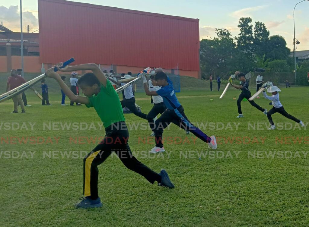 Young cricketers take part in a batting session at the start of phase two of Central Zone's U14 development programme at Preysal Recreation Grounds on October 15. - Photo by Jonathan Ramnanansingh