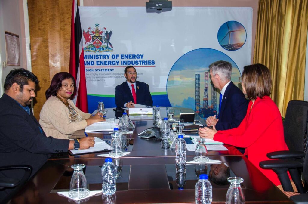 IN DISCUSSION: Terrance Ali, chemical engineer II, left; Sandra Fraser, permanent secretary, Energy Ministry; Stuart Young, Energy Minister; David Campbell, president, bpTT; and Giselle Thompson, VP of communications and external affairs, bpTT.
Photo courtesy MEEI - 