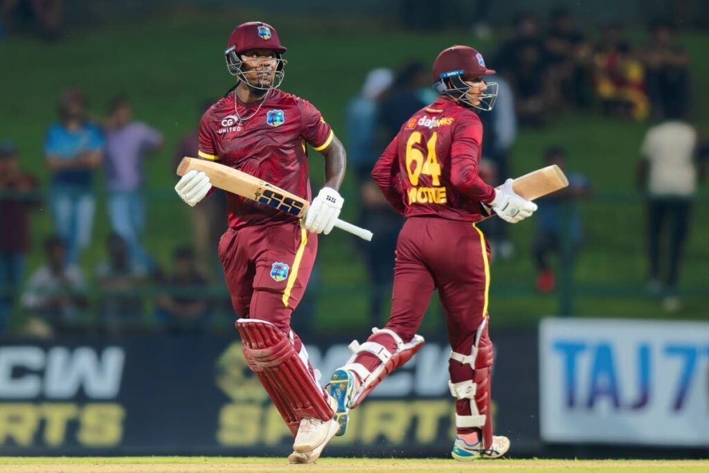 West Indies’ Sherfane Rutherford (L) and Gudakesh Motie run between the wickets during the second ODI match against Sri Lanka in Pallekele, Sri Lanka, on October 23. (AP Photo) - 