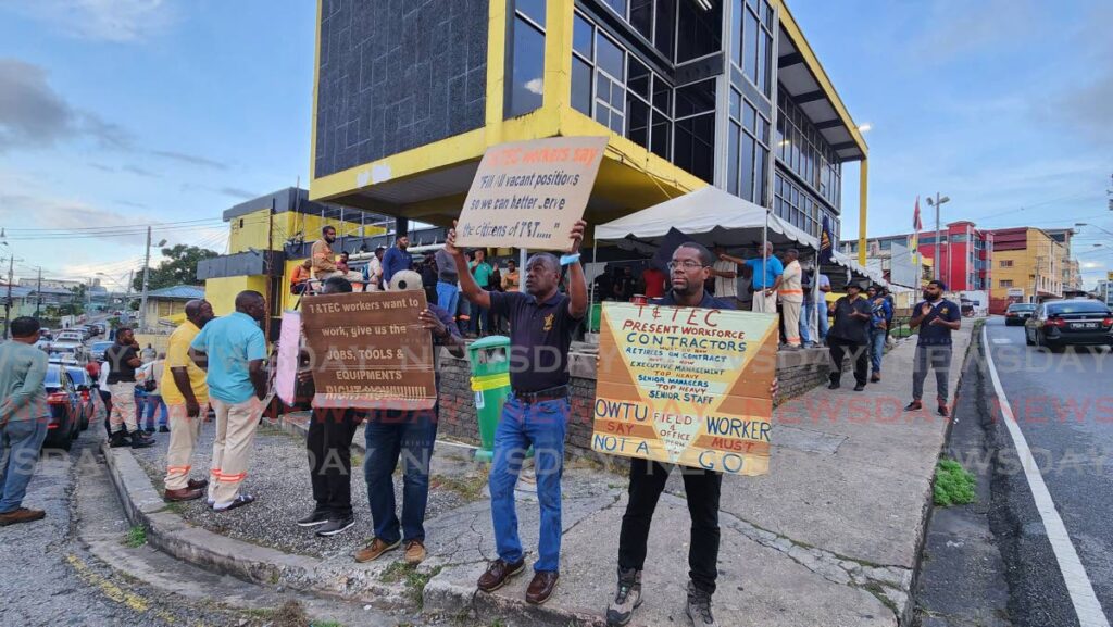 T&TEC workers protest outside the commission's Cipero Street office in San Fernando on October 24. - Photo by Yvonne Webb