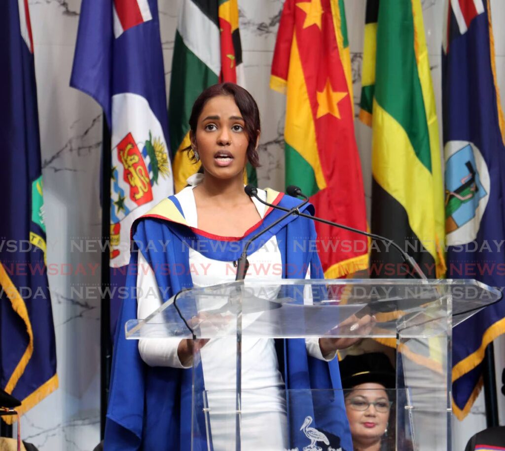 WE CAN DO IT: Melissa Edwards, valedictorian of the UWI  Faculty of Science and Technology, says graduates are resilient and can tackle the world's most urgent problems.  - Photo by Faith Ayoung