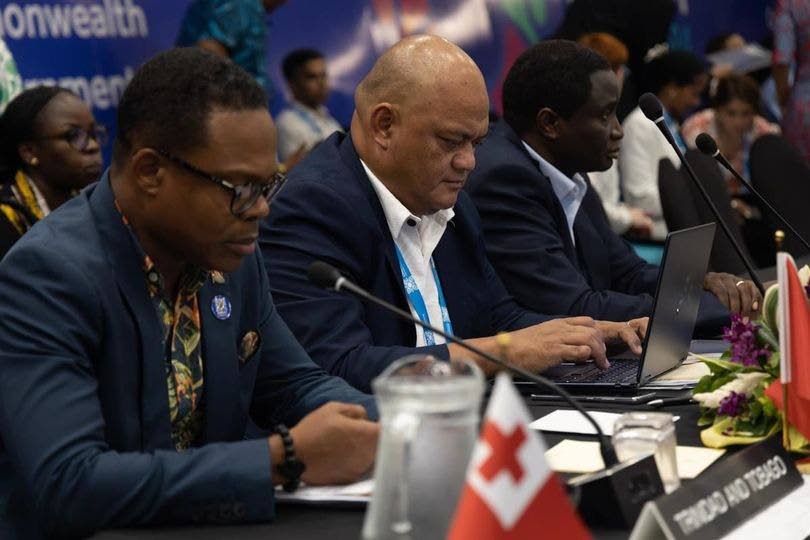 Minister of Foreign and Caricom Affairs Dr Amery Browne, left, at a meeting of foreign ministers at the Commonwealth Heads of Government Meeting (CHOGM) in Apia, Samoa on October 24. - Photo courtesy the Ministry of Foreign and Caricom Affairs - 