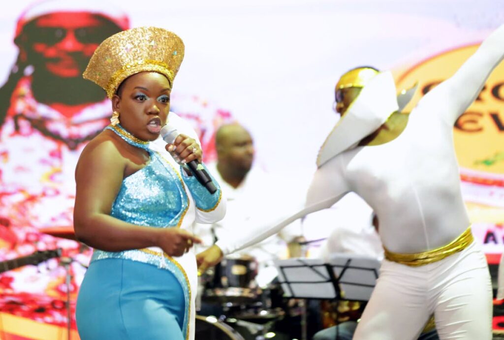 Nicole Thomas sings Crown Jewels on her way to victory in the Tobago Calypso Monarch at Magdalena Grand Beach and Golf Resort, Lowlands, October 24.  - Photo by Visual Styles 