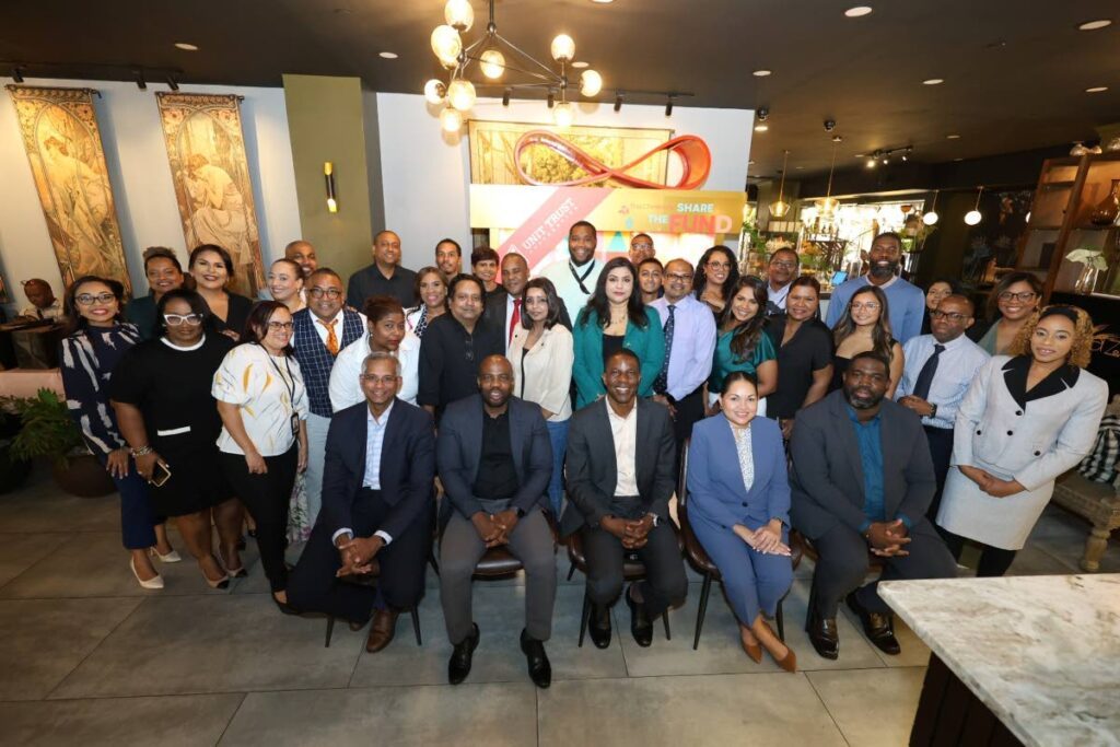 Nigel Edwards, executive director, UTC, seated at centre, and his senior leadership team hosted members of the media at Arazzi Restaurant, Maraval Road, Port of Spain on October 23. - Photo courtesy UTC