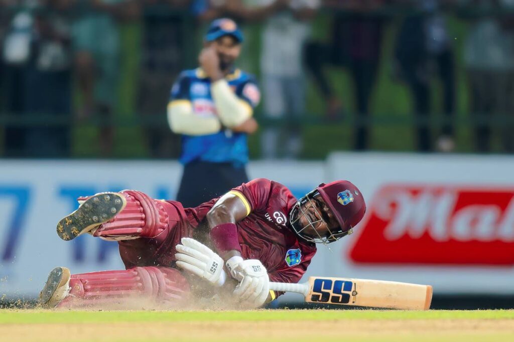 West Indies' Sherfane Rutherford dives into his crease during the second ODI cricket match between Sri Lanka and West Indies in Pallekele, Sri Lanka, Wednesday, Oct. 23, 2024. (AP Photo/Viraj Kothalawala) - AP