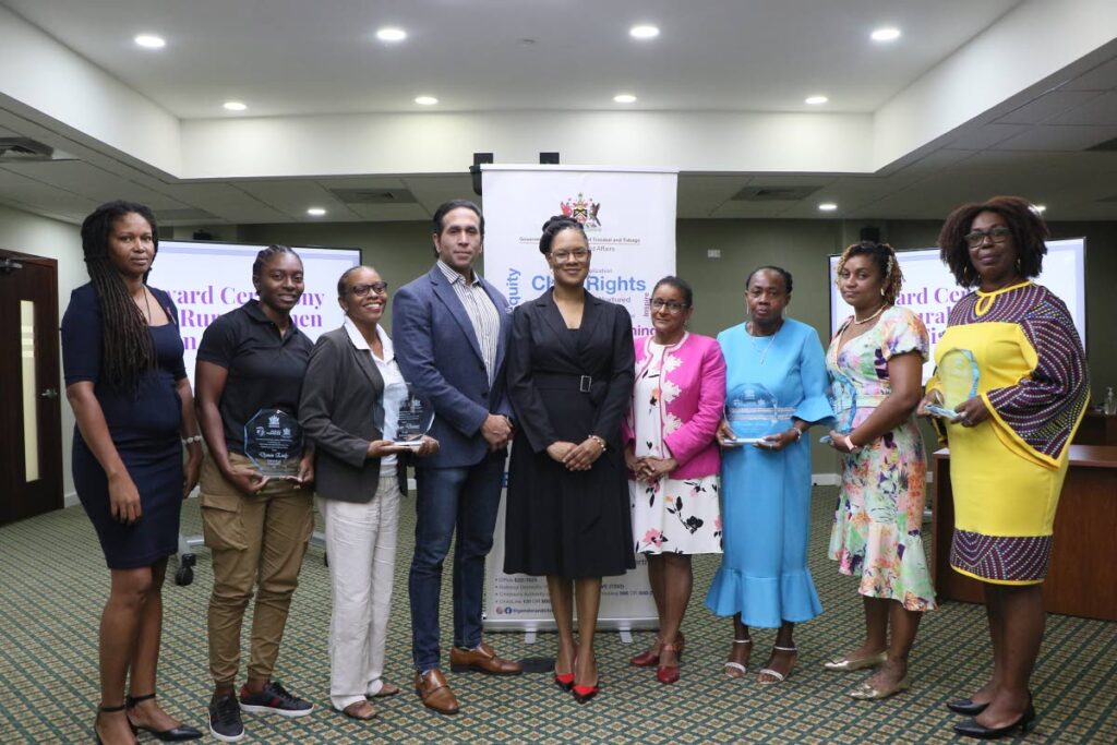 Minister of Gender and Child Affairs Ayanna Webster-Roy, centre, is flanked by Minister of Rural Development and Local Government Faris Al-Rawi and Senator Sunity Maharaj following the presentation of awards to five rural women in fisheries on October 25 at the Cabildo Building, Parliamentary Complex in Port of Spain. - Photo courtesy Ministry of Gender and Child Affairs