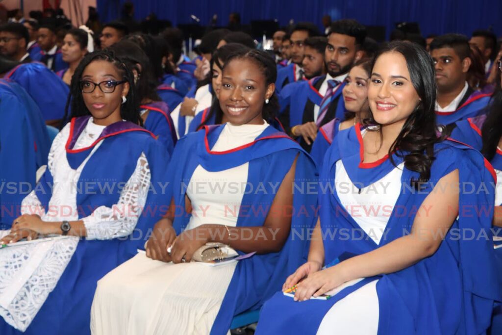 UWI medical science graduands (from left) Iruomachukwu Oguneme, Osayimwense Orumwense and Sarah Paltoo at their graduation ceremony, UWI SPEC, UWI, St Augustine on October 26. - Photo by Angelo Marcelle