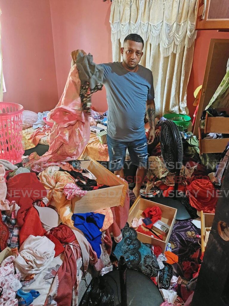 Chutney singer Sunil Ramsundar show a ransacked bedroom after bandits entered his home on Saturday night in Chase Village, Chaguanas. - Photo by Lincoln Holder 