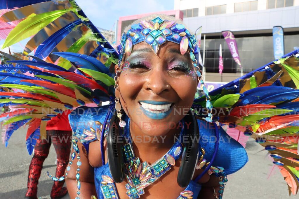 This masquerader from Jade Monkey Mas having fun in the sun in Scarborough.  - Photo by Ayanna Kinsale  