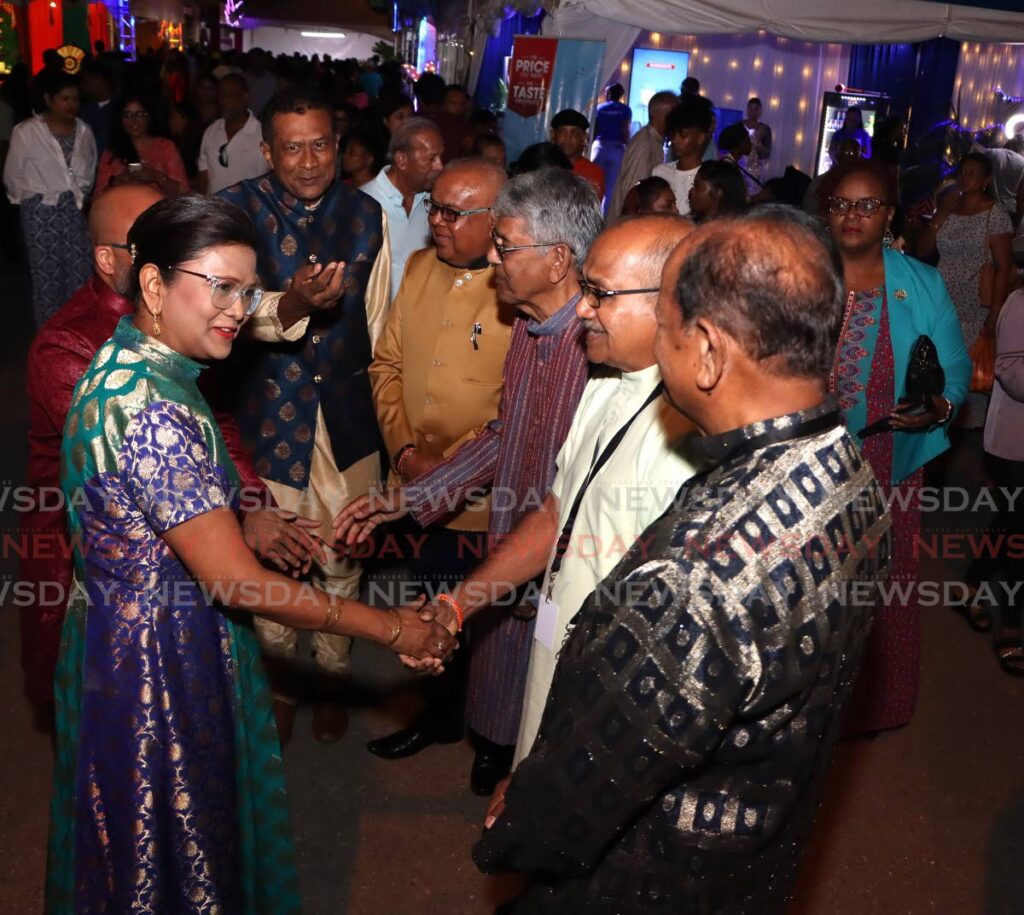 President Christine Kangaloo is greeted by members of the NCIC at the Divali Nagar, Chaguanas on October 29. - Photo by Angelo Marcelle